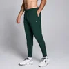 MP Training Woven Joggers til mænd – Dark Emerald